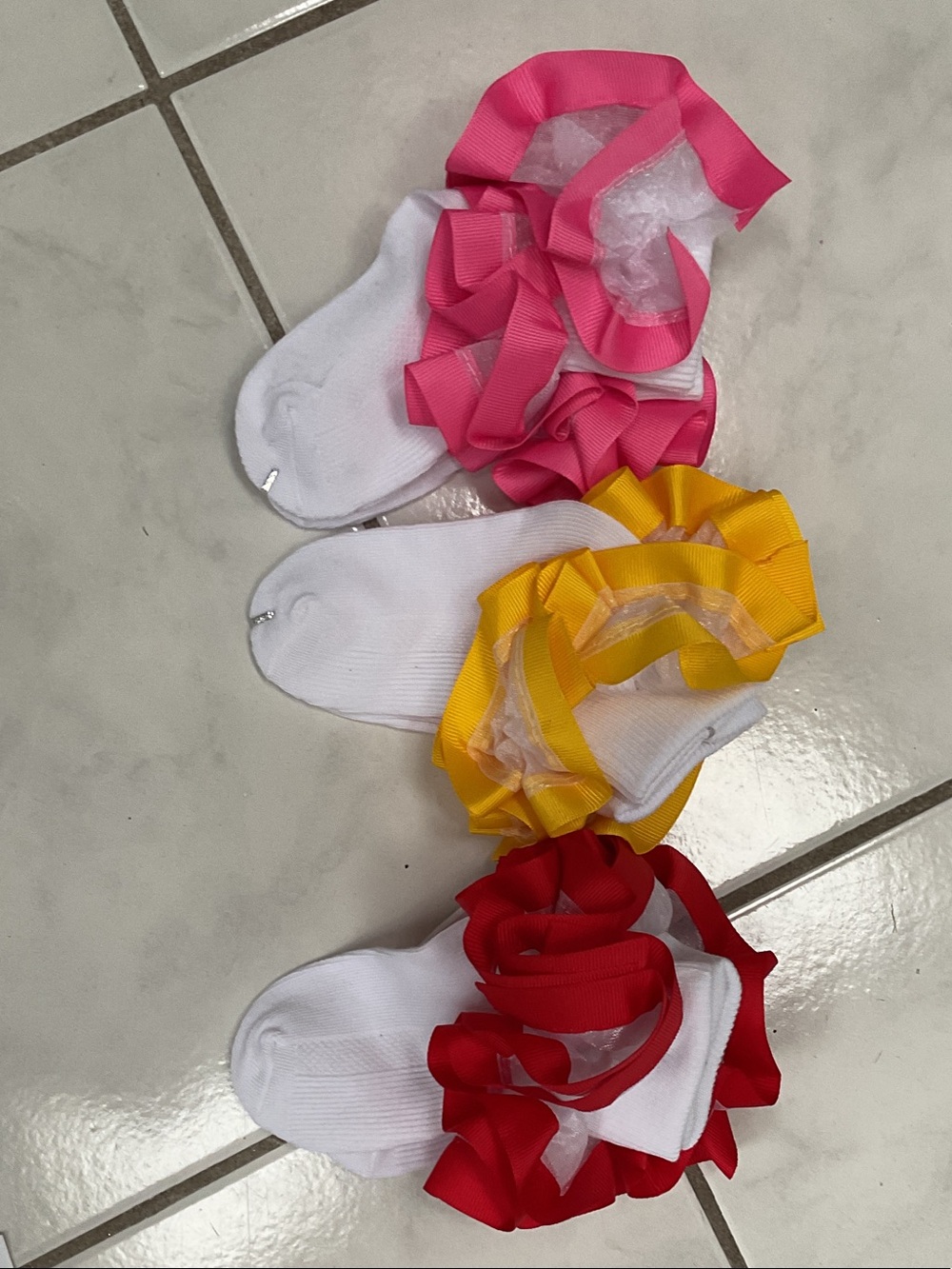 Girls White Ruffle Socks with Pink, Yellow and Red Bows